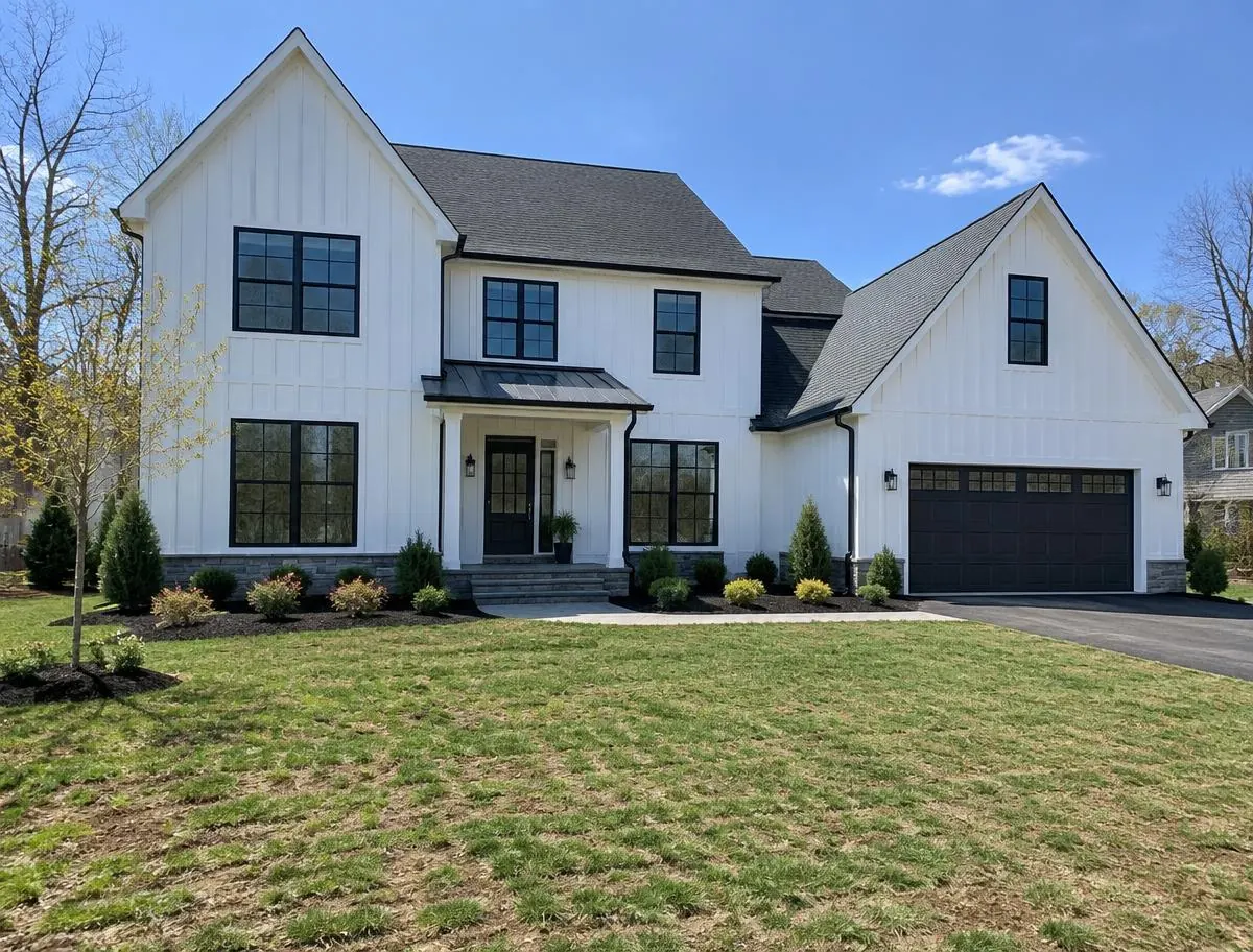New-construction home with a young lawn in Fanwood, NJ