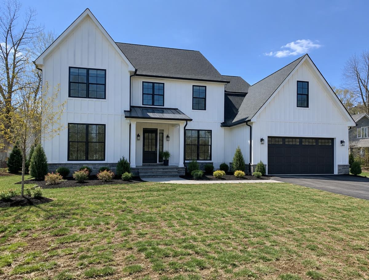 New-construction home with a young lawn in Fanwood, NJ